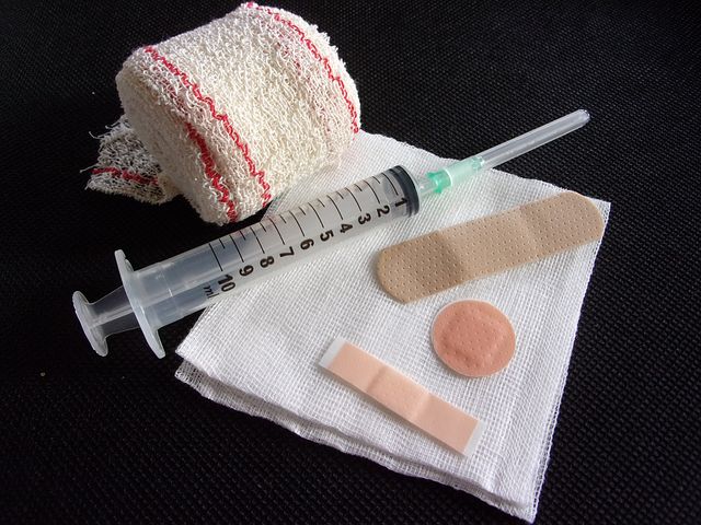 syringe and band aids